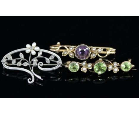 A diamond and pearl brooch of flower spray form within a scrolling border, a peridot and pearl bar brooch set in 9ct gold and