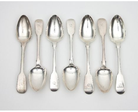Two sets of three Georgian silver dessert spoons, fiddle pattern, London 1869 and 1901 and one other spoon, approximately 250