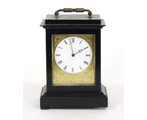 A mid 19th Century timepiece in an ebonised case, the white enamel dial with chased and engraved gilt brass surround, 20cm hi