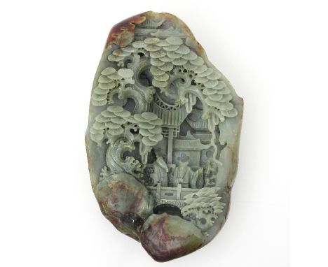 A Chinese large dark celadon jade stone covered with figures in a pavilion, 25.5cm high