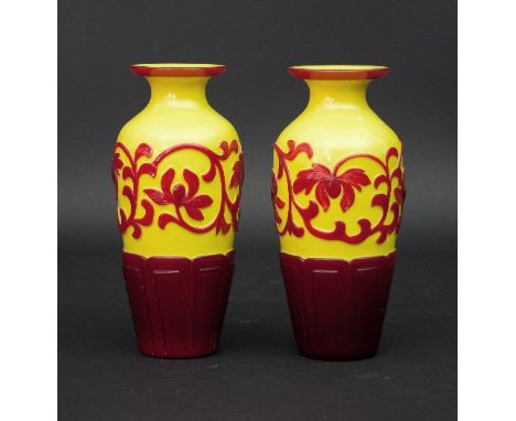 A pair of Chinese cameo glass vases, of baluster form decorated stylised foliage in red on yellow, 20.5cm high Condition Repo