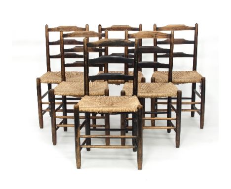 A set of six ladder back chairs with rush seats