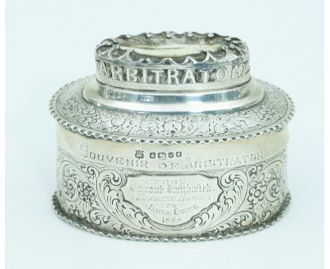 Horse racing interest: a Victorian silver presentation box, John & William Deakin, Sheffield 1888, of oval shape, the cover s