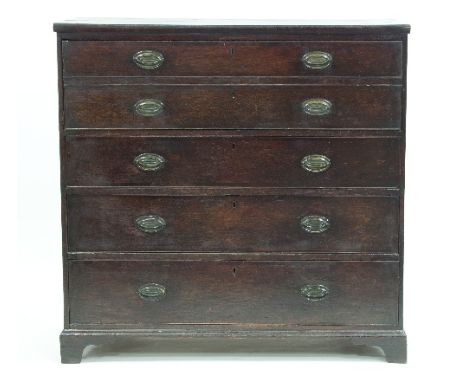 A George III mahogany secretaire, fitted three long drawers and two dummy front drawers, the interior fitted with drawers and