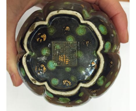 A Chinese ceramic double gourd bottle vase, decorated with gold and turquoise spots on a black background, seal mark beneath,