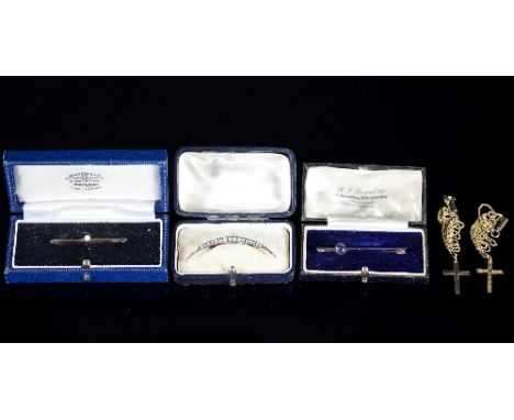 A turquoise and split pearl crescent brooch set in 9ct gold, a tie pin set with a blue topaz, a 9ct gold bar brooch set with 