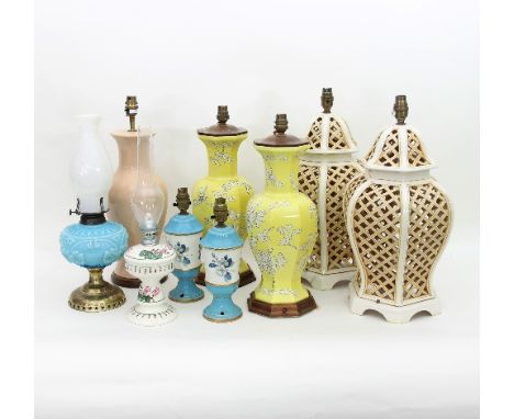 Two pairs of ceramic table lamps and five other lamps