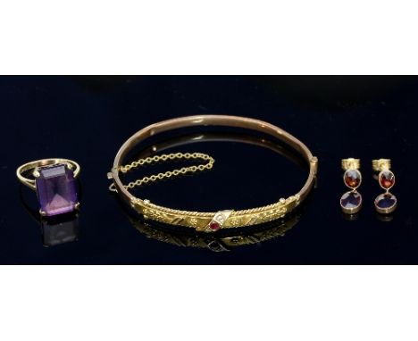 A pair of garnet drop earrings, a ruby and diamond set bangle and a dress ring set in 9ct gold Condition Report: Lot 532:
Ear