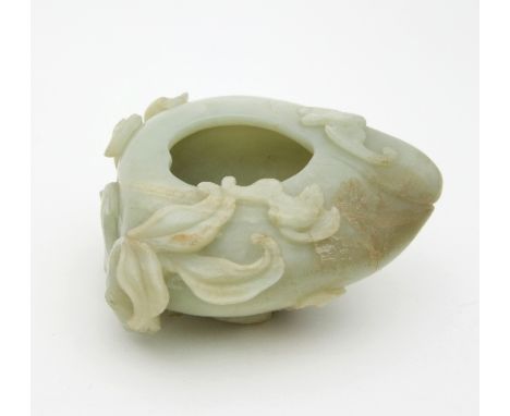 A Chinese jade brush washer, carved as a peach and set with leaves and bats, 13cm high Condition Report: Overall appearance g