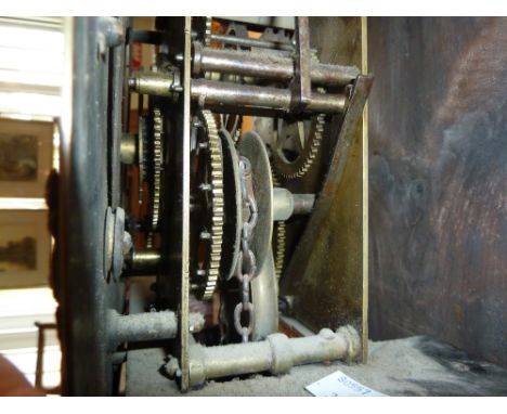 An 18th Century longcase clock, Giles Coates of Chedworth, the brass dial applied with fretwork to each corner, Roman numeral