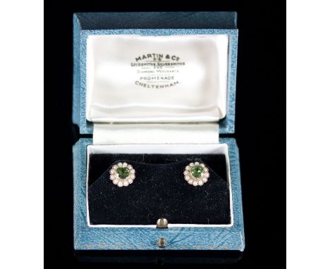 A pair of peridot and seed pearl cluster ear studs, set in 9ct gold, boxed by Martin & Co., Cheltenham
