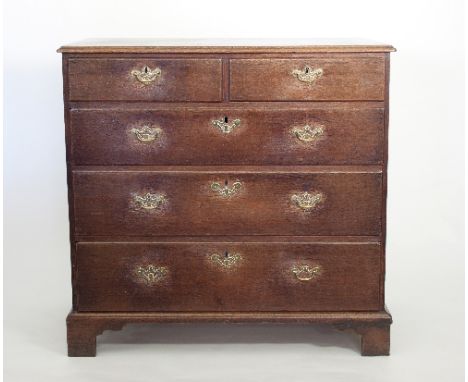 A large George III oak chest of two short and three long drawers, on bracket feet, 103cm wide