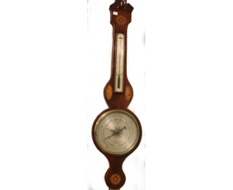 A mahogany wheel barometer and thermometer, the silvered dial signed D Charinelli, Gloucester, the case inlaid with shell and