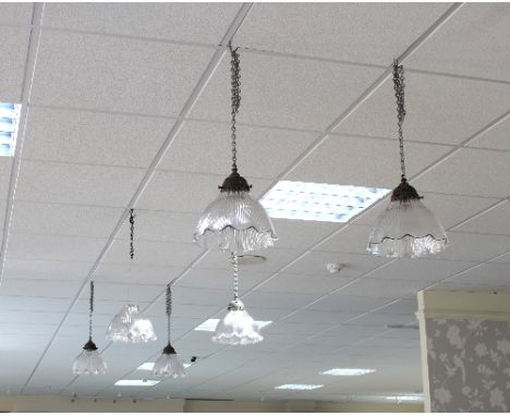 Six Holophane glass light shades with frilled borders