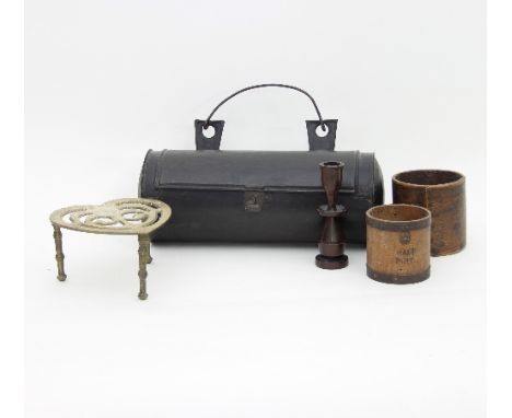A tin candlebox, 34cm wide, a brass trivet, two bushel measures and a treen candlestick