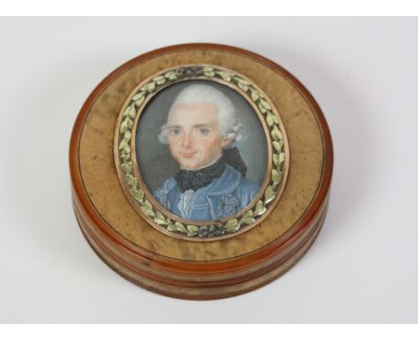 18th Century French School Miniature: A rare and important head and shoulder "Oval Portrait of a French Nobleman," in an elab