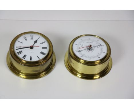 A small modern circular brass Wall Clock, and a similar matching Barometer. (2)