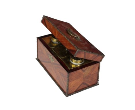 A Regency period kingswood Tea Caddy, with brass drop handle and ornate escutcheons, the edges with decorative ormolu mounts,