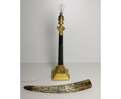 An attractive heavy antique Corinthian style Table Lamp, with dark marble pillar support, on a stepped gilt base; and an engr