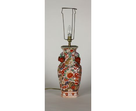 An attractive Imari type Vase, with shape top fruit handles, decorated with mythical animals and flowers, converted as a lamp