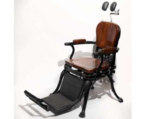 An exceptionally fine late Victorian large heavy metal Dentist Chair, with walnut back, seat and arms, with manual adjustment