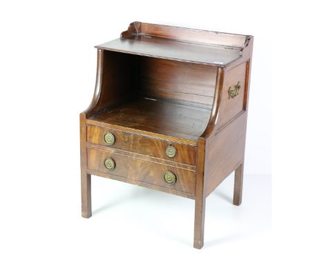 A 19th Century Irish mahogany Commode, with gallery back and lift top over false drawers with brass circular handles on squar