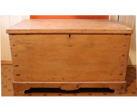 A good 19th Century stripped pine Coffer, with wrought iron hinges etc., and with shaped apron on bracket feet. (1)