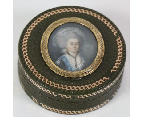 A small rare late 18th Century circular gold mounted tortoiseshell Box, with inset miniature, "Half length Portrait of the Co