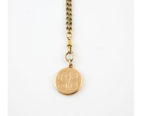 Victorian gold locket, the front engraved with initials GC, the reverse 'From Ruth and Esther 1895', 9ct, on a gold watch cha