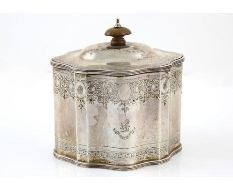 George V silver tea caddy, of serpentine form chased with scroll and swag border and engraved with the family crest of the Bo