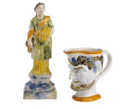 A PRATTWARE FIGURE OF CERES AND A PRATTWARE SATYR MUG,  C1800 figure 19.5cm h++The figure well coloured but with some old dis