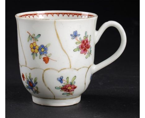 A WORCESTER COFFEE CUP, C1775  of Gold Queen's pattern with polychrome sprigs, 6cm h++Localised wear to gilding 