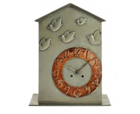 A RARE LIBERTY & CO TUDRIC PEWTER MANTLE CLOCK IN THE STYLE OF C F A VOYSEY, C1905 with copper chapter ring, steel hands and 