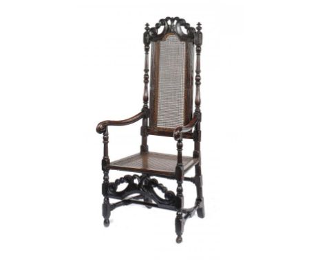 A QUEEN ANNE PAINTED BEECH AND CANED ELBOW CHAIR, c1710-20  136cm h++The back of the fore-stretcher strengthened by the addit