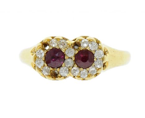 A RUBY AND DIAMOND DOUBLE CLUSTER RING in 18ct gold, Birmingham 1895, size M++In fine condition, consigned by executors of a 