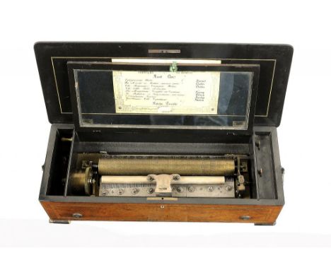 A SWISS WALNUT HARP PICCOLO MUSICAL BOX, C1880 with 33cm pinned cylinder, the eight airs listed on the original lithographed 