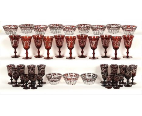A BOHEMIAN ENGRAVED RUBY GLASS SUITE, C1900  including finger bowls, goblets 16cm h (46)++The lot in good condition