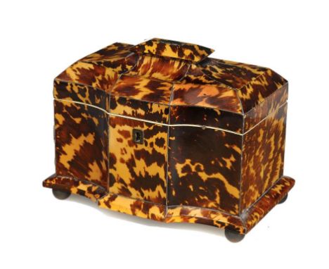 A VICTORIAN TORTOISESHELL TEA CADDY,  C1840 with cavetto front and pagoda lid in well mottled shell, the divided interior ret
