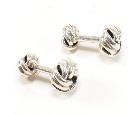 A pair of 925 silver knot cufflinks.&nbsp;Marked STERLING.&nbsp;Cufflinks measure 2.3cm x 1.2cm.&nbsp;Weight 12g. All weights