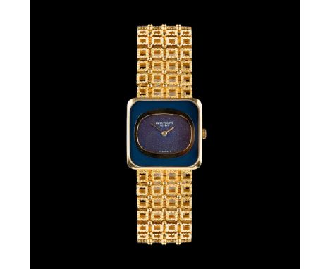 Patek Philippe. Armbanduhr 'Golden Ellipse Grey Dial' mit Gold-Armband. 1970er. 18 kt. GG, gest., ziseliert. Handaufzug. Dunk
