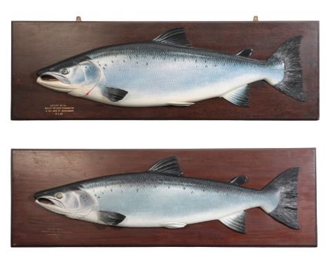 JOHN AND DHUIE TULLY OF FOCHABERS: A RARE PAIR OF CARVED WOODEN SALMON with naturalistic painted decoration and with relief f