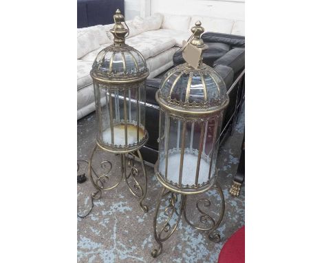 ORANGERY LANTERNS, a pair, on stands, vintage inspired, gilt finish, 117cm H. (2)