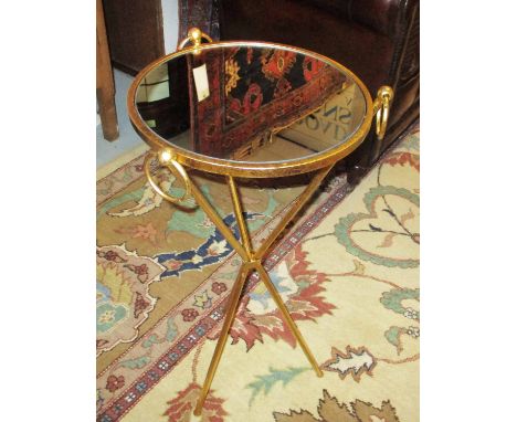OCCASIONAL TABLES, a pair, gilt metal framed, each with a circular mirrored top and ring handles, 36cm diam x 77cm H. (2) 