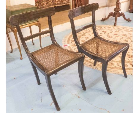 SIDE CHAIRS, a pair, vintage Anglo-Colonial Regency style Ceylonese ebony, each with cane seat and sabre supports. (2)