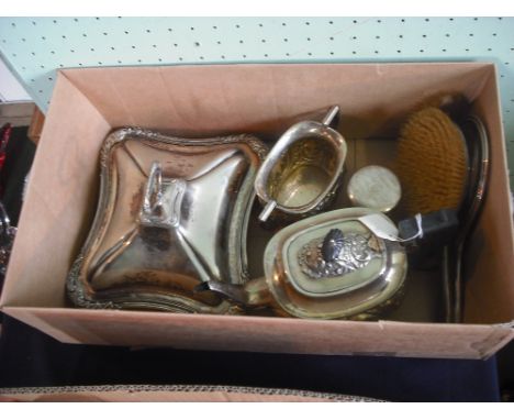 A silver backed part-dressing table set, to include: brushes, hand mirror and lidded jar, together with a silver plated teapo