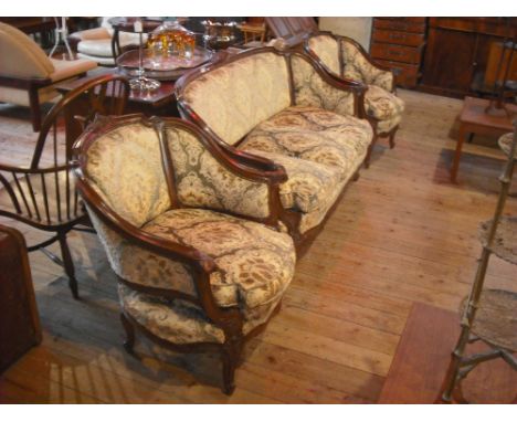 An Edwardian three piece salon suite, comprising three seater sofa and two armchairs. Condition Report: Overall condition goo