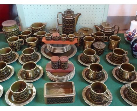 A large quantity of Hornsea Heirloom pattern teawares, green ground, to include: teapot, coffee pot, cups & saucers, preserve