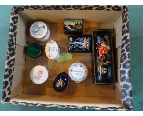 Three 20th century Russian papier mache boxes, each with painted decoration to lid, together with a quantity of ceramic pill 