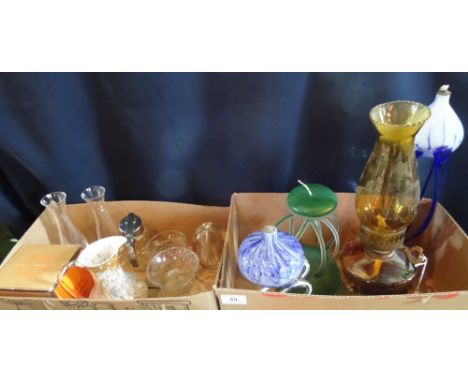 An Edwardian amber coloured glass oil lamp, together with three contemporary glass oil burners and a quantity of other glassw