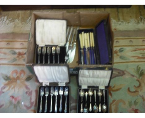 A cased set of six silver cake forks, together with a cased set of six silver teaspoons, two sets of cased silver plated flat